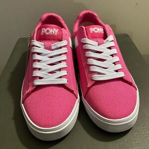 pink pony sneakers with white accents